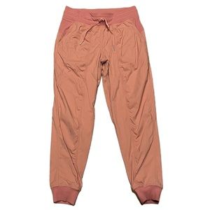 Orange studio pants from lululemon